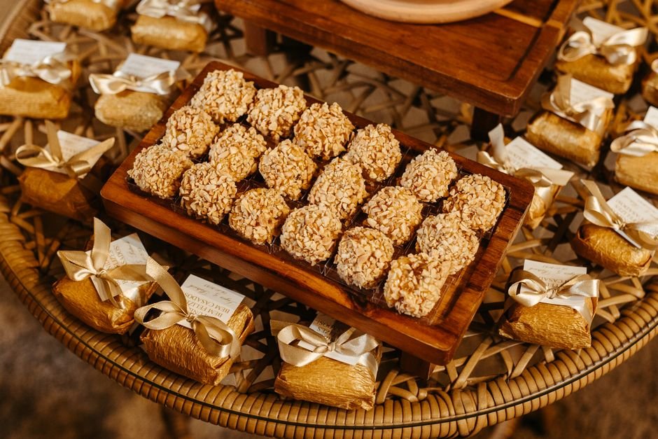 Top down view of an assorted gourmet snack basket spread on a table