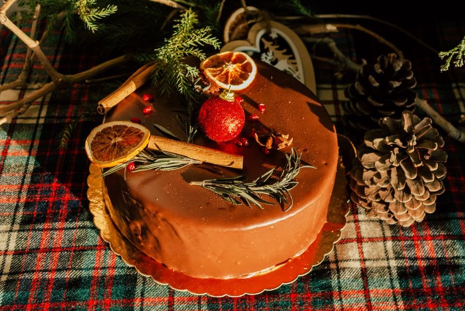 A festive holiday spread featuring orange slices and pine decoration