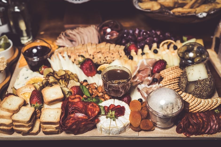 Charcuterie style food gift basket arrangement