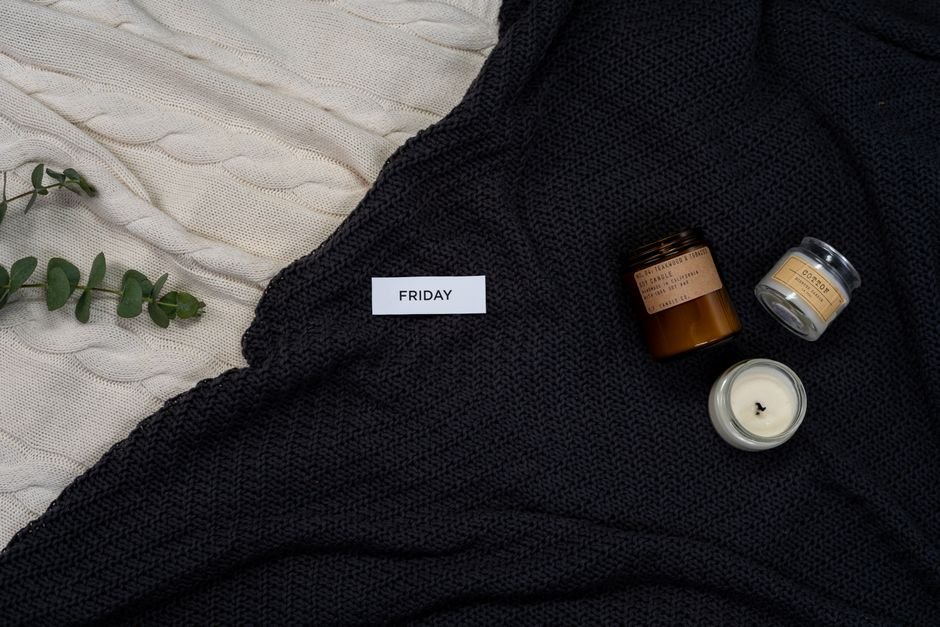 Cozy candles and blankets self care flat lay