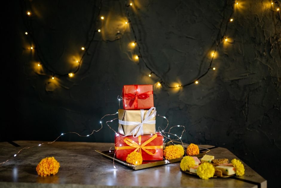 Stacked branded gift boxes arranged on a table for a corporate order