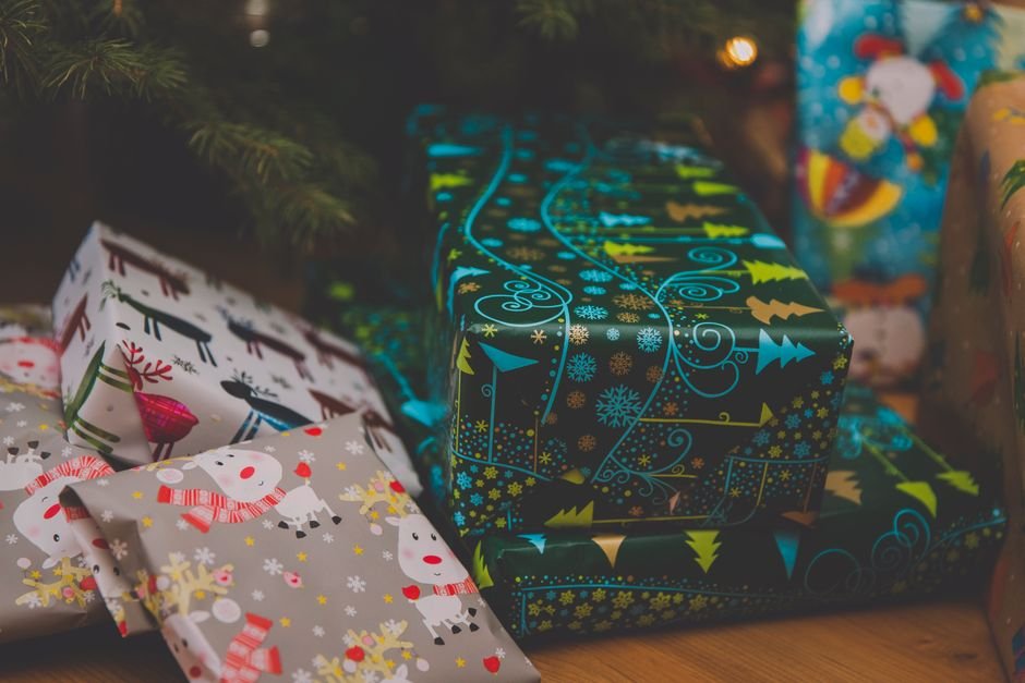 Wrapped presents under the tree, among the best family gift ideas for Christmas