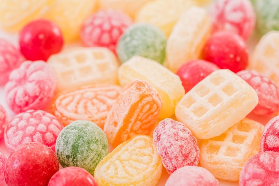 Close-up of nostalgic hard candy in assorted shapes and colors