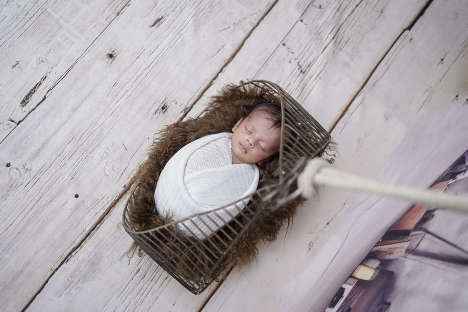Newborn baby sleeping peacefully, the quiet moments a postpartum care package helps support